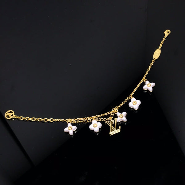 ˇSirae GemˇLOGO 6 MOTIF STAR AND SUN GOLD BRACELET